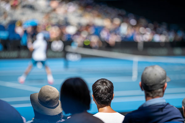 female Professional athlete Tennis player playing on a court in a tennis tournament in summer